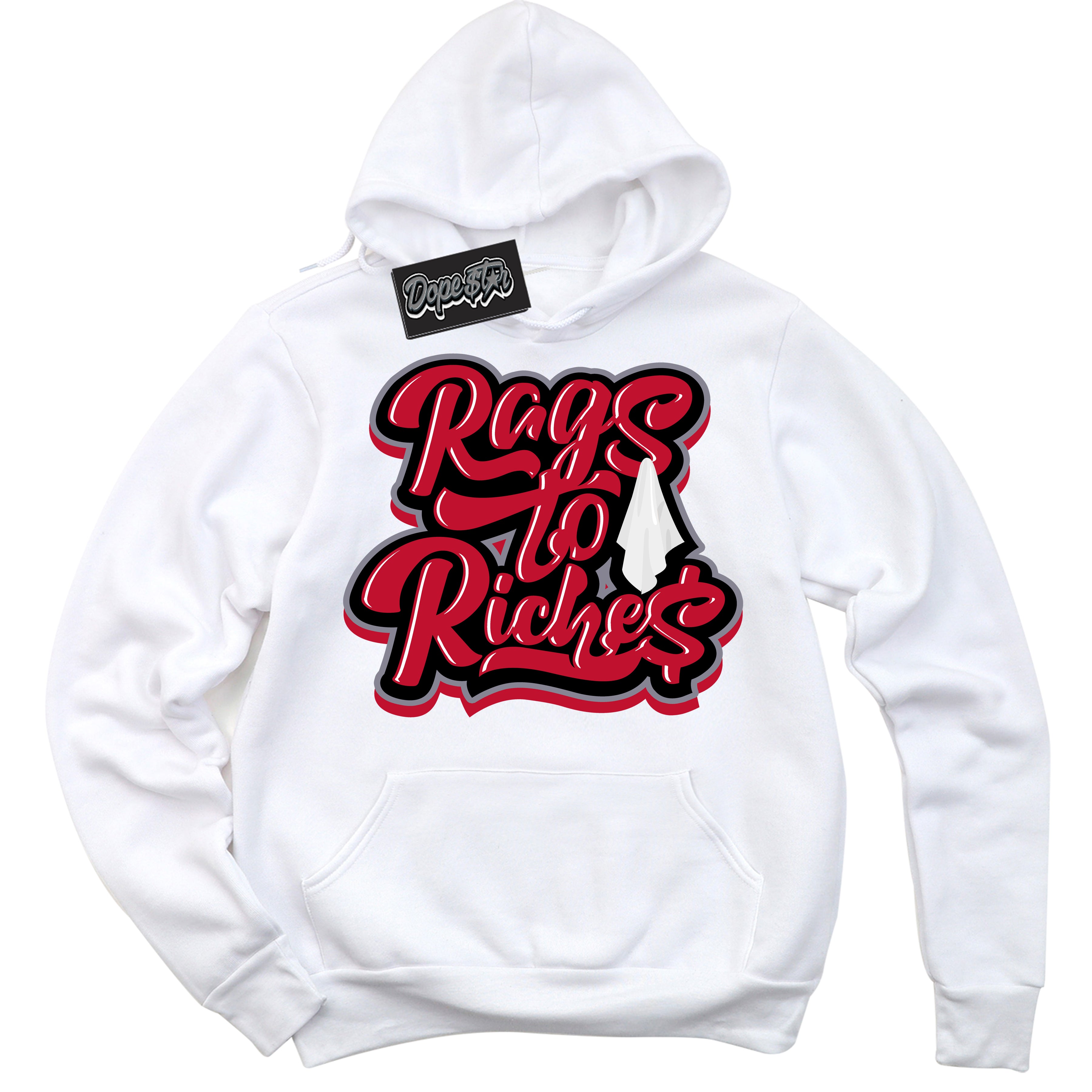 Cool White Hoodie with “ Rags To Riches '' design that Perfectly Matches Cement Grey Fire Red 1s Sneakers.