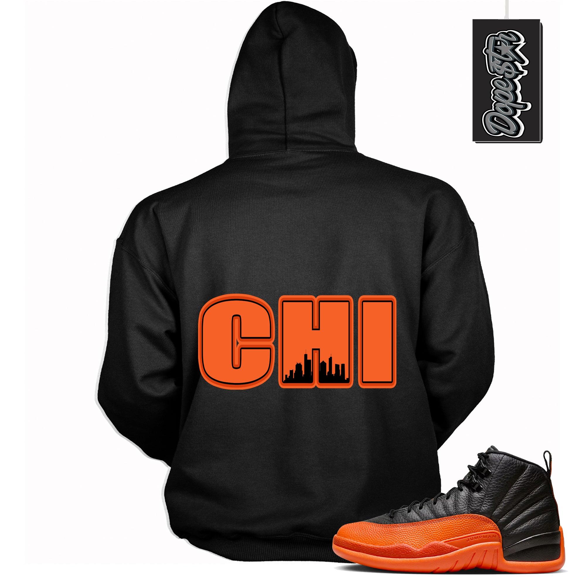 Cool Black Graphic Hoodie with “ Chicago “ print, that perfectly matches Air Jordan 12 Retro WNBA All-Star Brilliant Orange sneakers