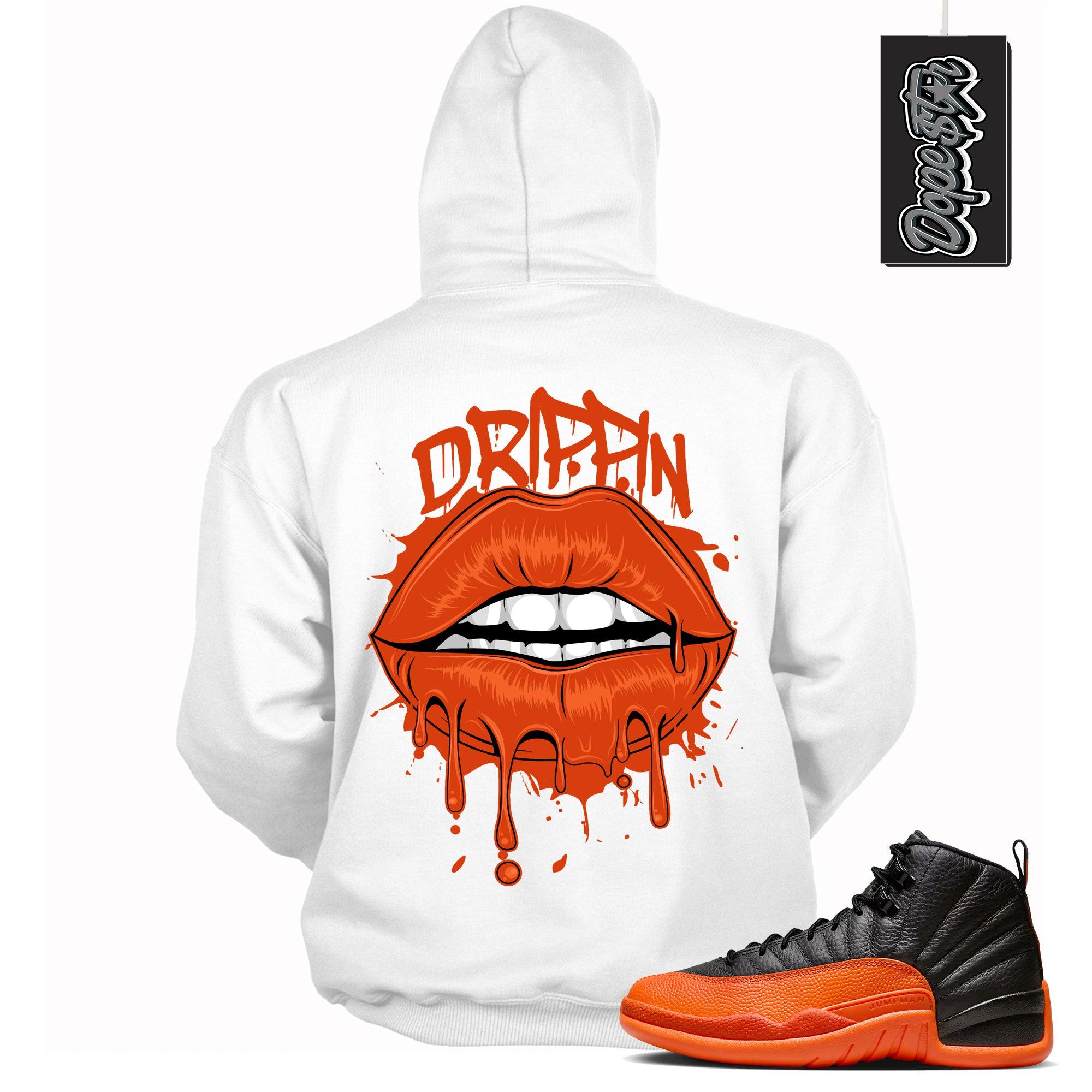 Cool White Graphic Hoodie with “ Drippin Lips “ print, that perfectly matches Air Jordan 12 Retro WNBA All-Star Brilliant Orange sneakers