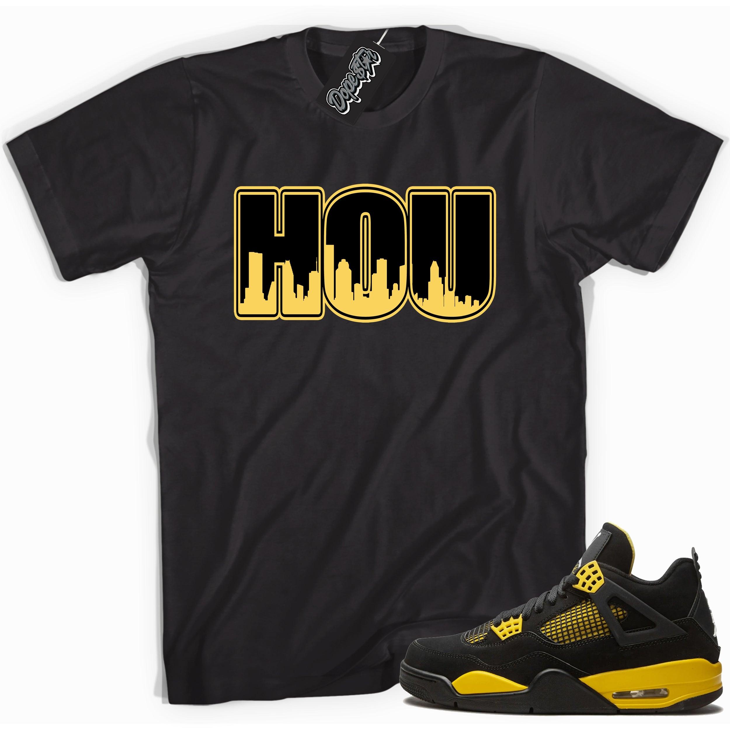 Cool black graphic tee with 'HOU' print, that perfectly matches Air Jordan 4 Thunder sneakers