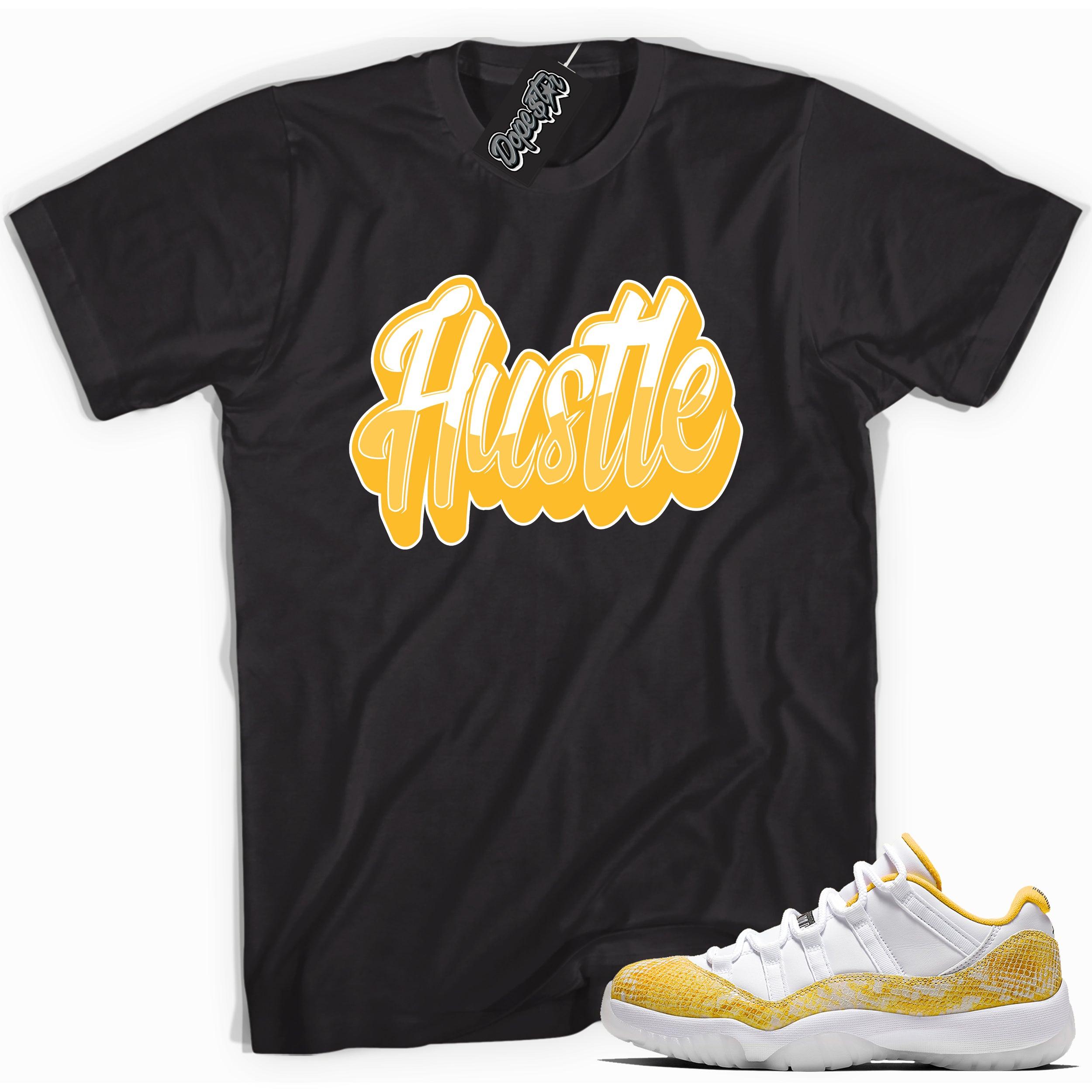 Cool black graphic tee with 'hustle' print, that perfectly matches Air Jordan 11 Low Yellow Snakeskin sneakers