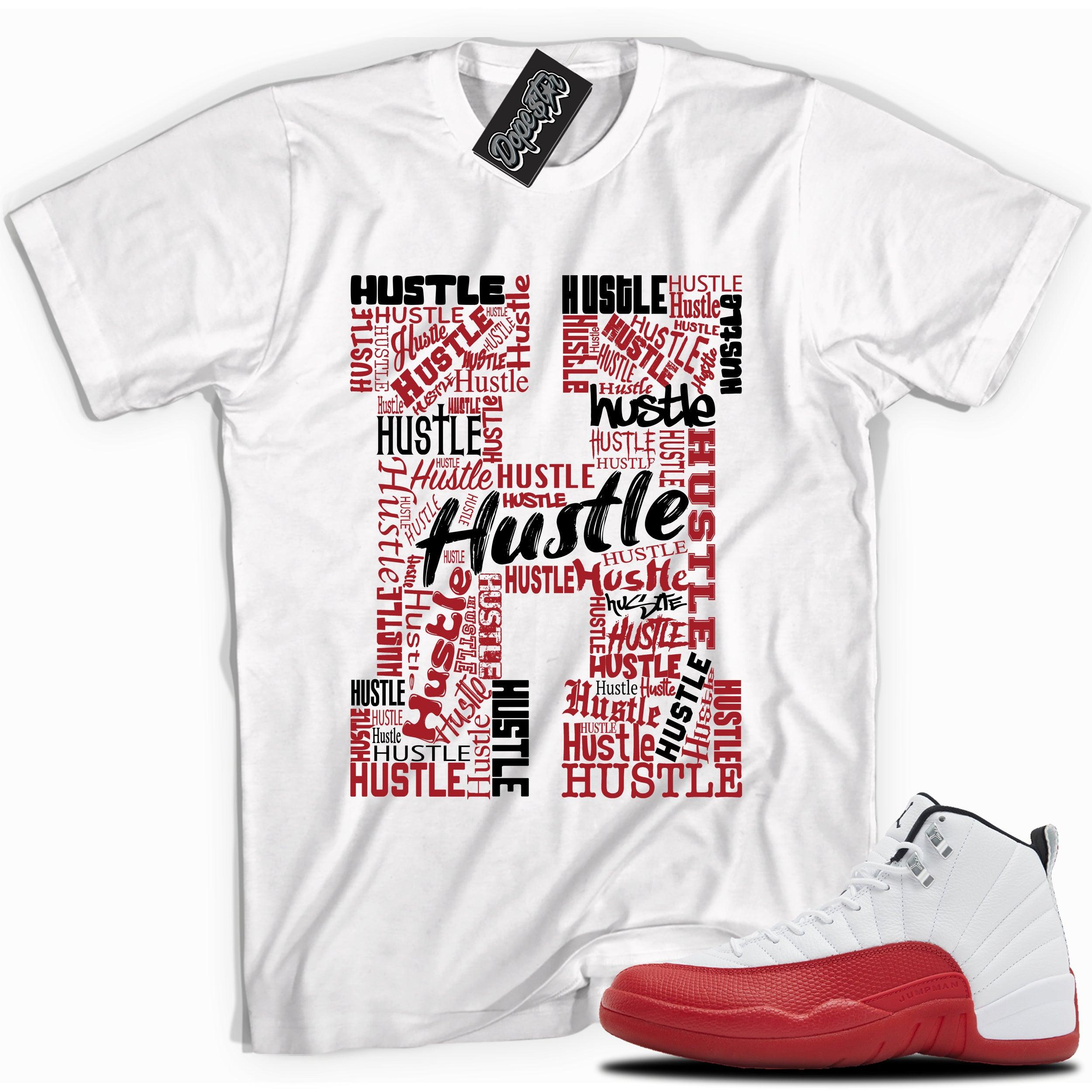 Cool White graphic tee with “ Hustle 2 ” print, that perfectly matches Air Jordan 12 Retro Cherry Red 2023 red and white sneakers