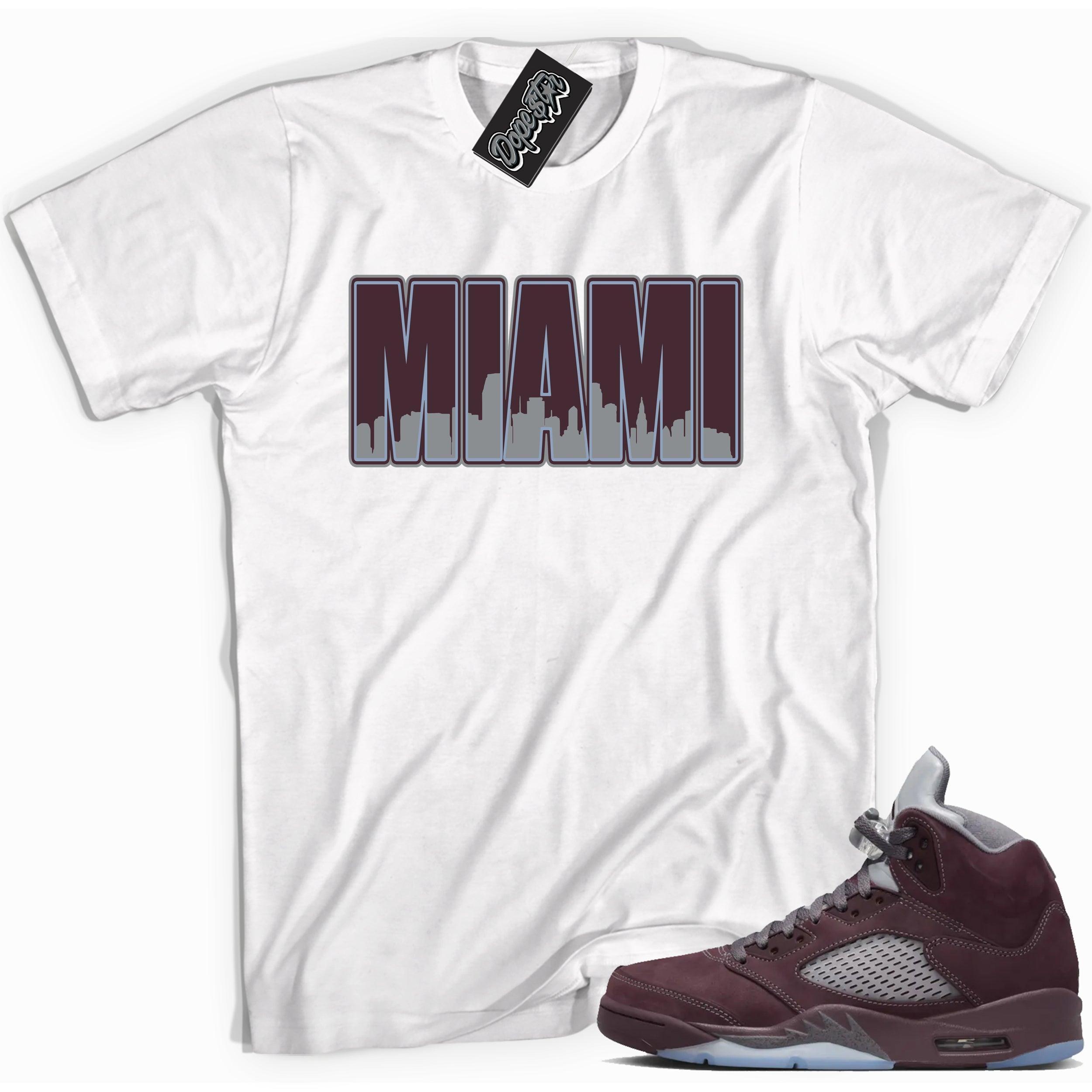 Cool White graphic tee with “ MIAMI ” print, that perfectly matches Air Jordan 5 Burgundy 2023 sneakers