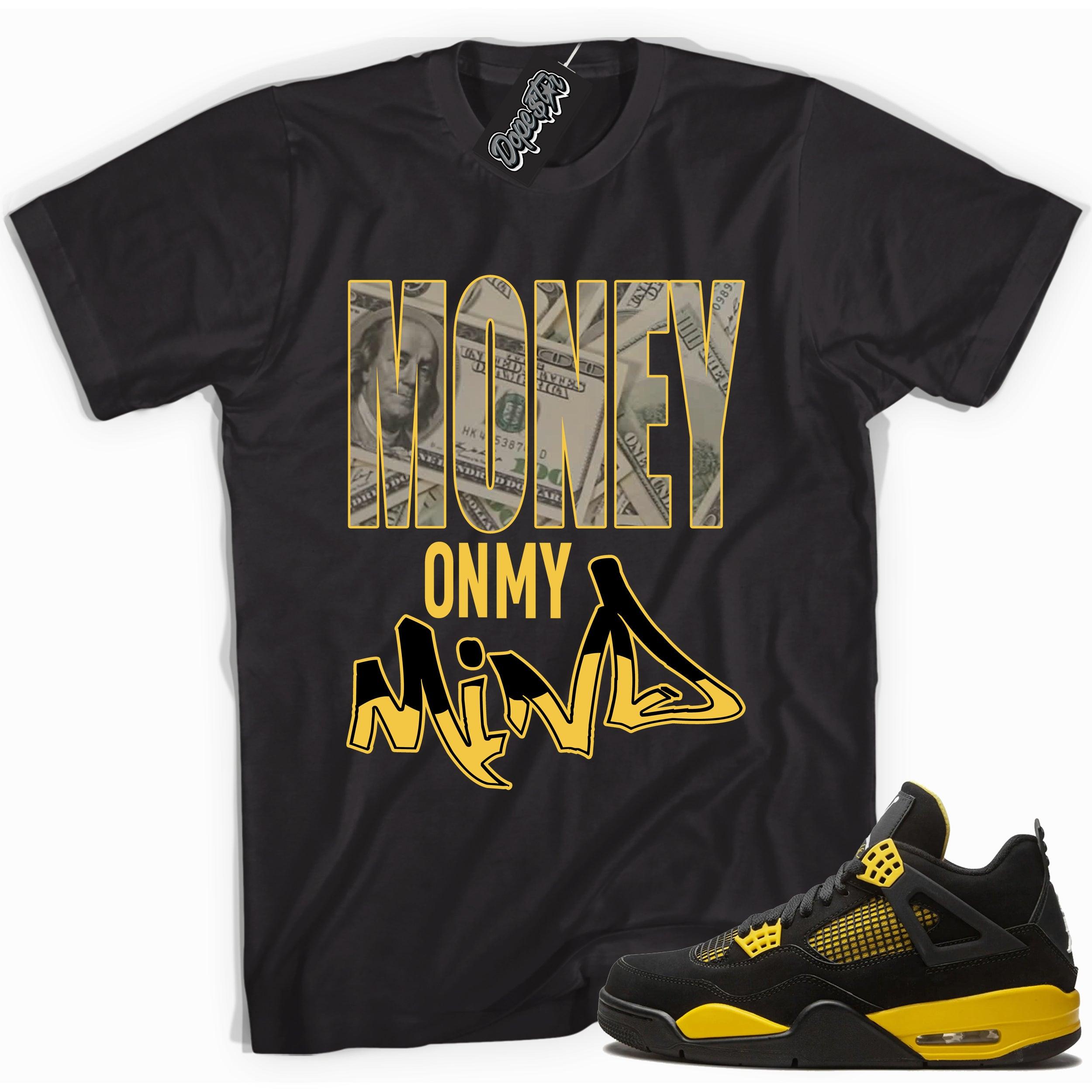 Cool black graphic tee with 'money on mind' print, that perfectly matches Air Jordan 4 Thunder sneakers