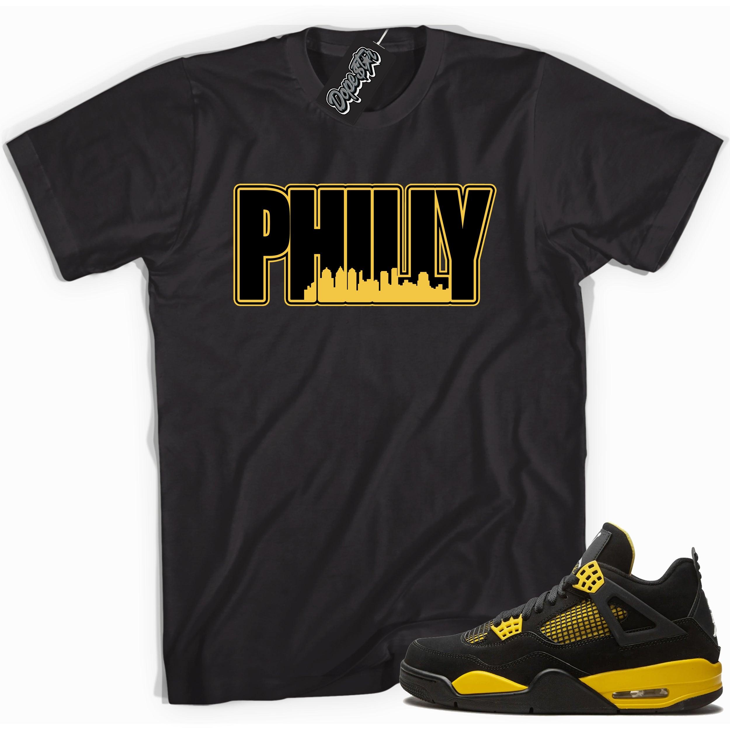 Cool black graphic tee with 'philly' print, that perfectly matches Air Jordan 4 Thunder sneakers