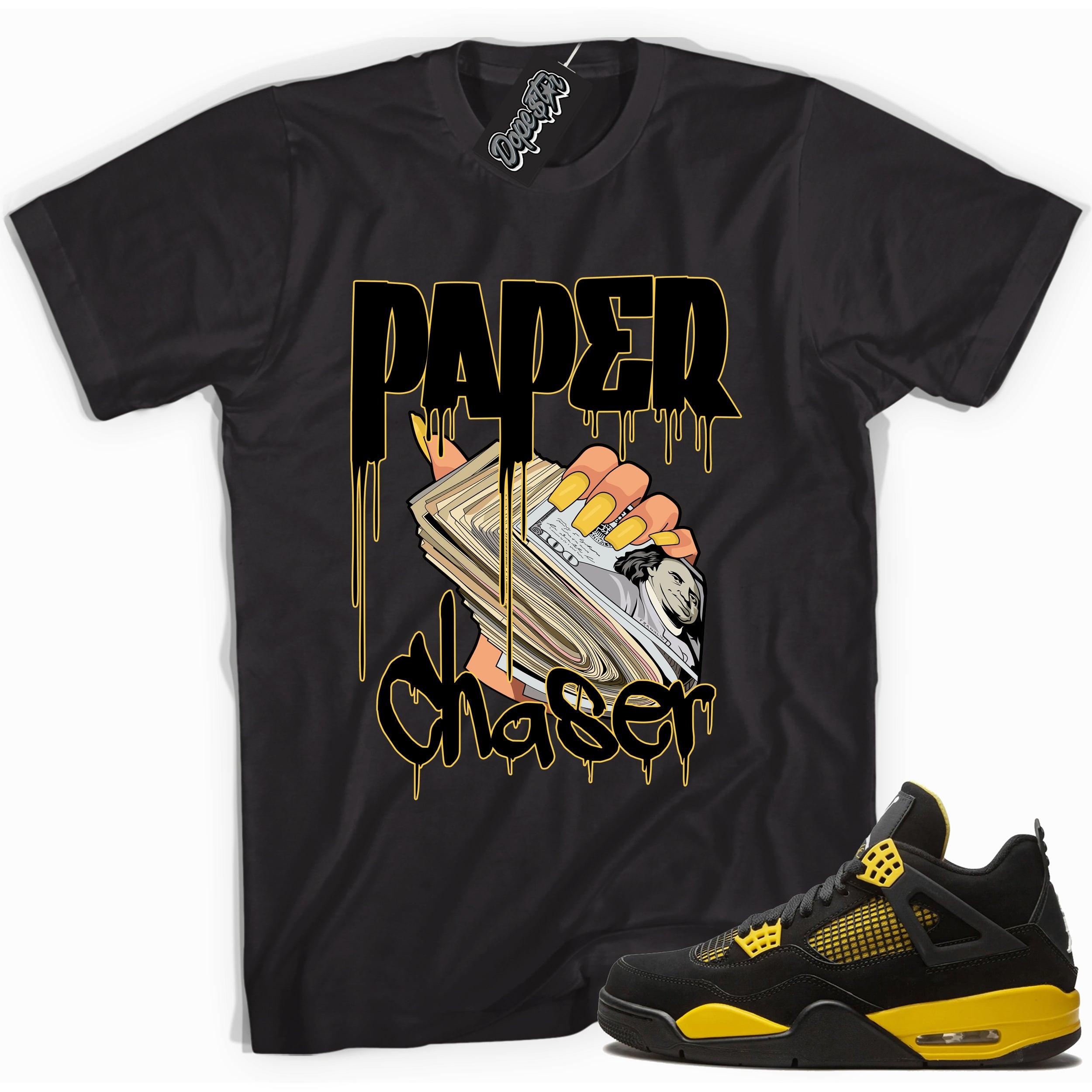 Cool black graphic tee with 'paper chaser' print, that perfectly matches Air Jordan 4 Thunder sneakers