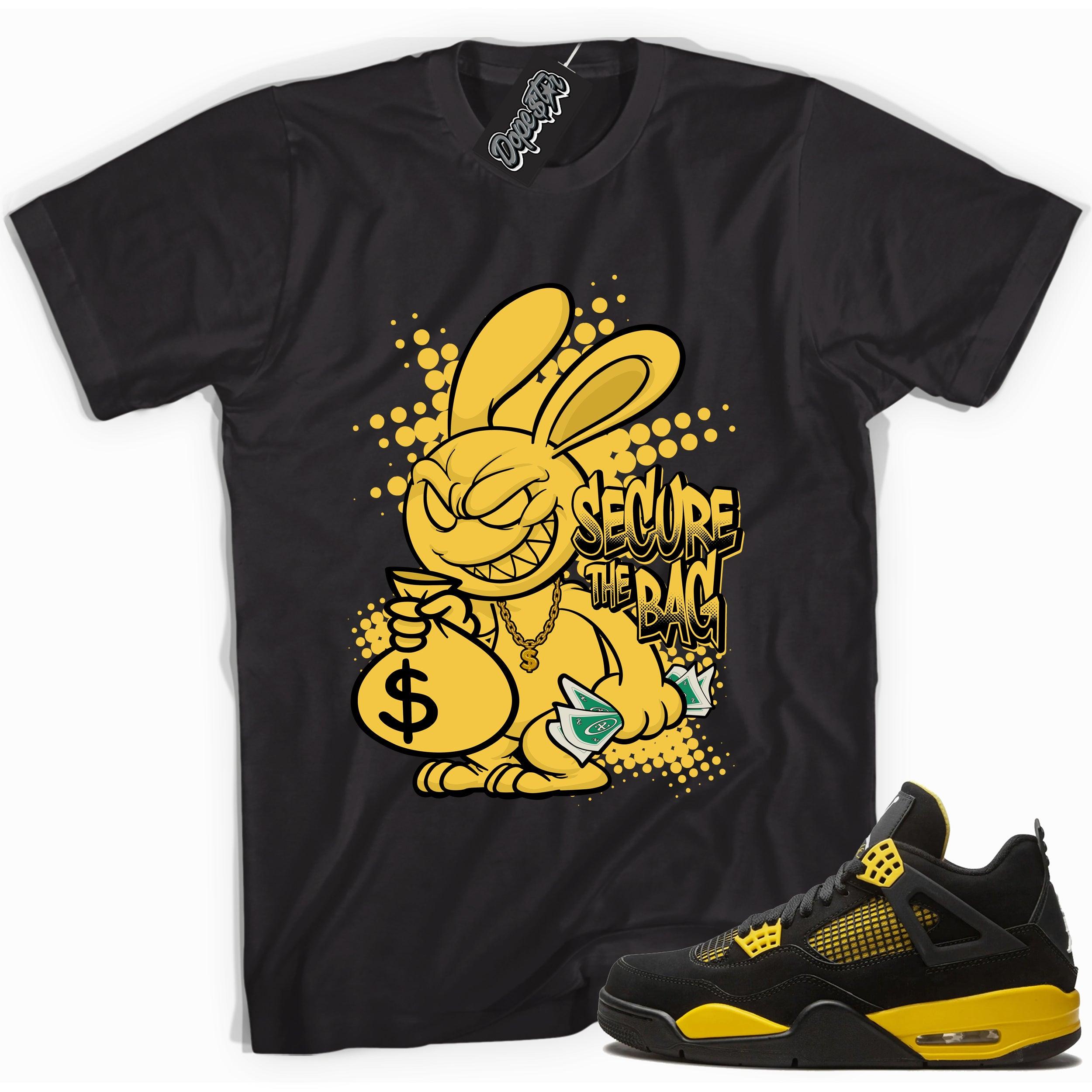 Cool black graphic tee with 'secure the bag' print, that perfectly matches Air Jordan 4 Thunder sneakers