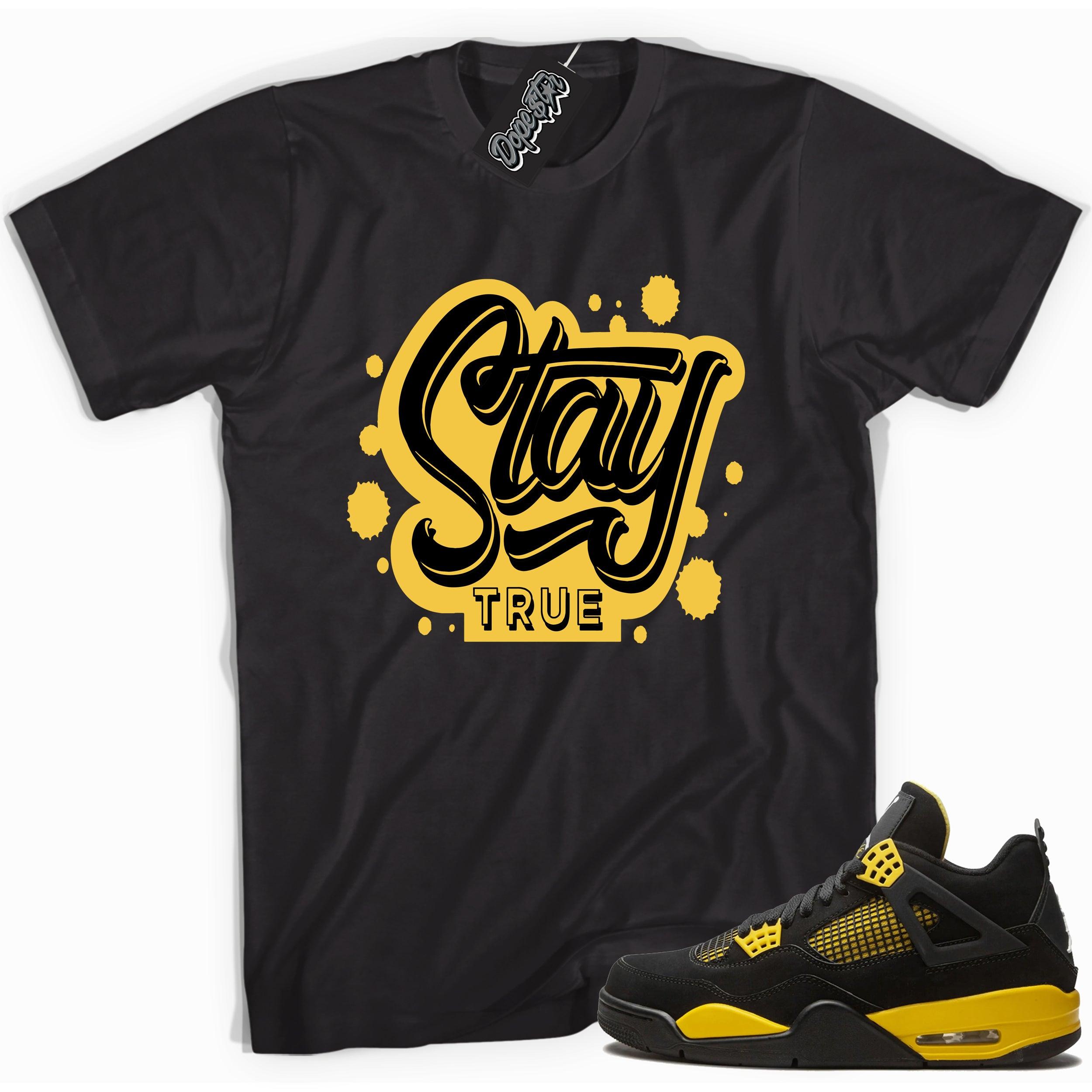 Cool black graphic tee with 'stay true' print, that perfectly matches Air Jordan 4 Thunder sneakers